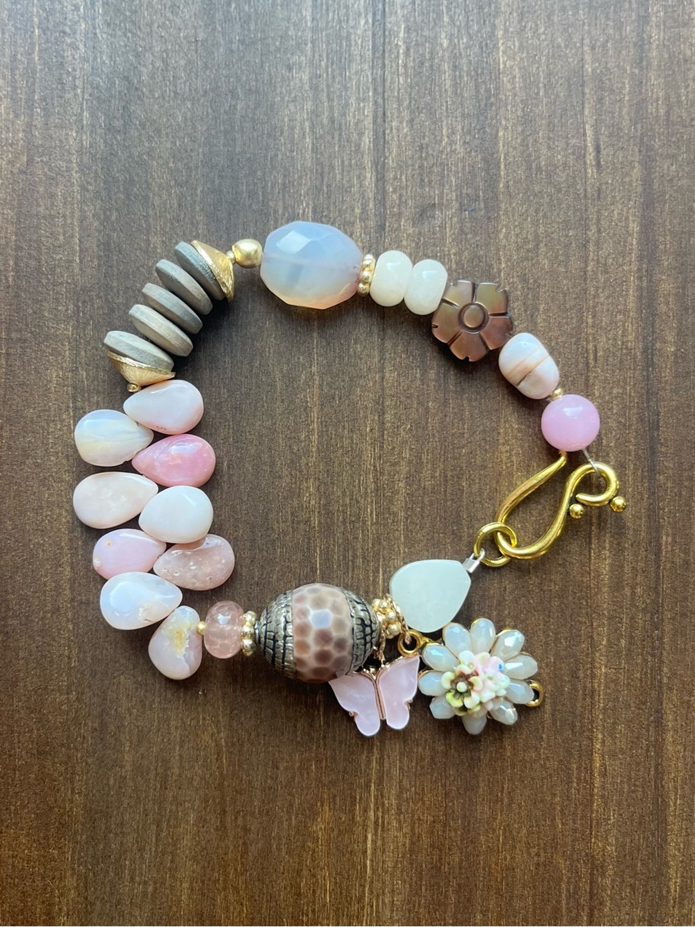 Delicate Peruvian opal and charm bracelet
